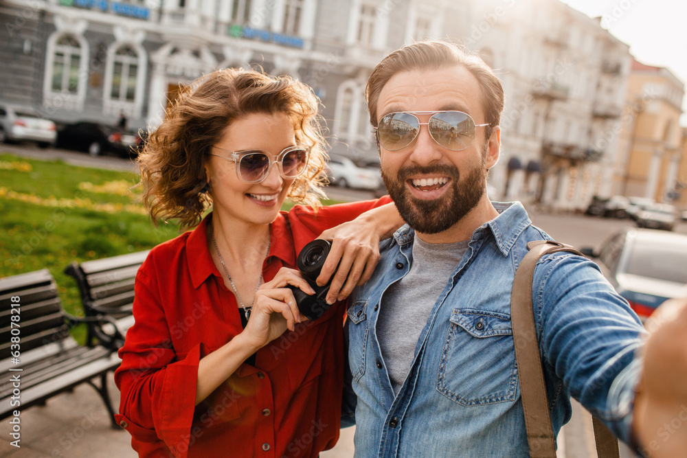 Fototapeta premium man and woman on romantic vacation walking together
