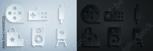 Set Stereo speaker, Rolling pin, Paper shopping bag, Wood easel or painting art boards, Gamepad and Film reel icon. Vector
