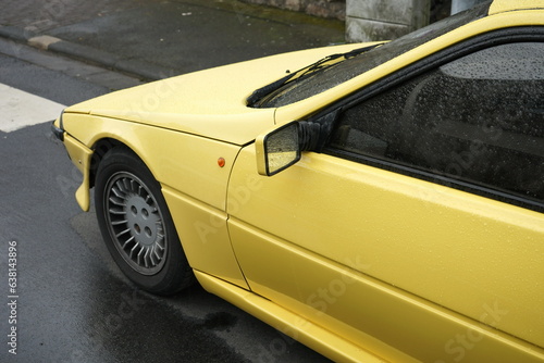 Französischer Sportwagen der Achtzigerjahre in Gelb mit Frontspoiler und Heckspoiler beim Oldtimertreffen Golden Oldies in Wettenberg Krofdorf-Gleiberg bei Gießen in Hessen photo