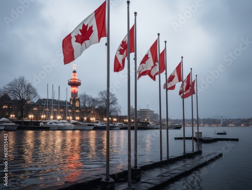 Canadian flags at gray sky