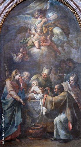 NAPLES, ITALY - APRIL 20, 2023: The painting of Circumcision of Jesus in the church Chiesa di Santa Caterina da Siena by unknown artist. 