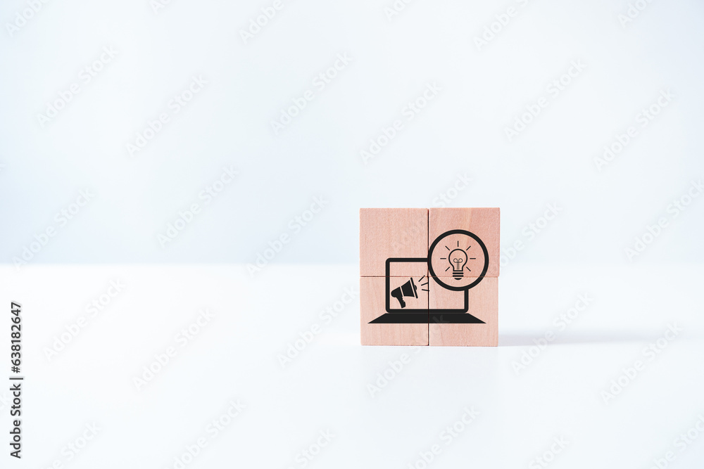 Obraz premium Creative marketing icon on wooden cube block. Creative marketing concept. Leveraging technology, data analysis, and customer insights to create innovative campaigns that engage audiences, drive ROI.