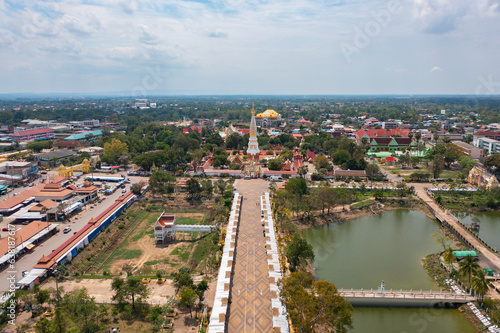 Wat Phrathat Phanom, Nakhon Phanom, Isan Temple. The pagoda is a buddhist temple in urban city town, Thailand. Thai architecture landscape background. Tourist attraction landmark.