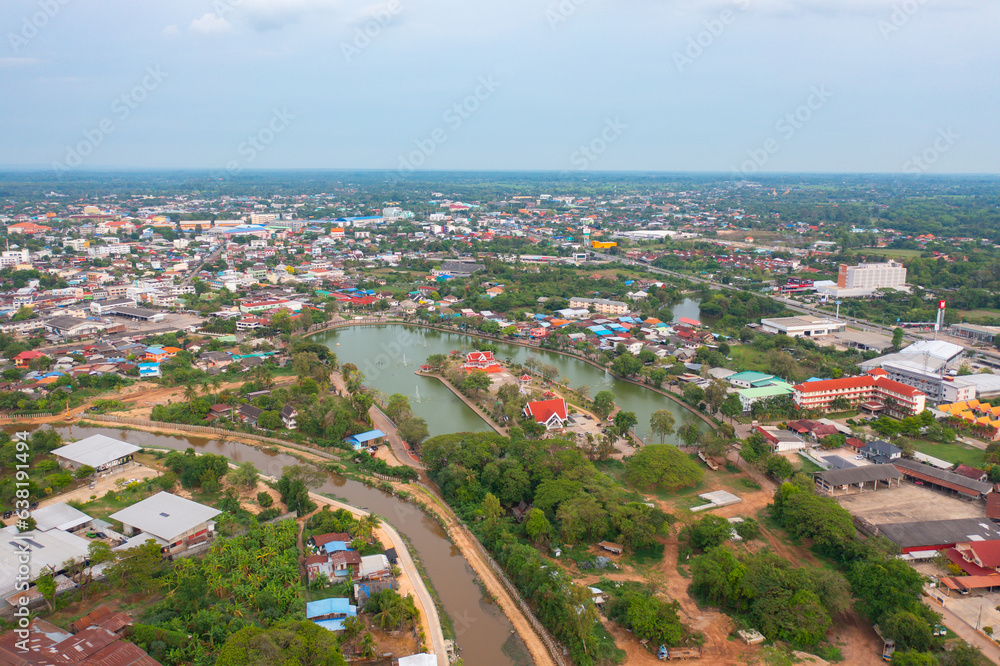 Aerial view of residential neighborhood roofs. Urban housing development from above. Top view. Real estate in Kalasin, Isan province city, Thailand. Property real estate.