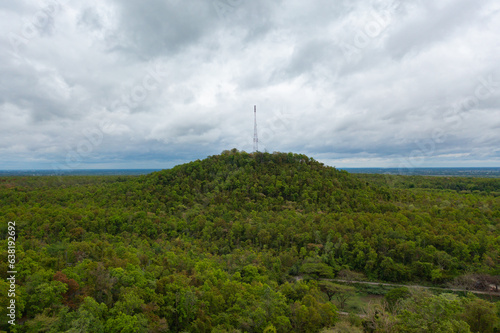 Aerial top view of lush green trees from above in tropical forest in national park in summer season. Natural landscape. Pattern texture background. © tampatra