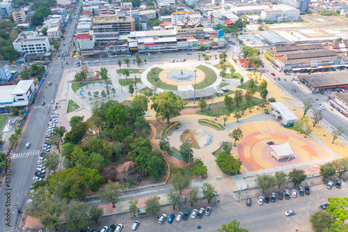 Aerial view of square landmark monument with residential neighborhood roofs. Urban housing development from above. Top view. Real estate in Isan urban city town, Thailand. Property real estate.