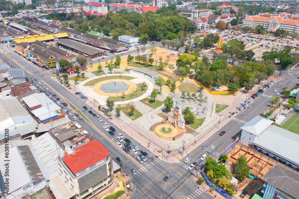 Aerial view of square landmark monument with residential neighborhood roofs. Urban housing development from above. Top view. Real estate in Isan urban city town, Thailand. Property real estate.