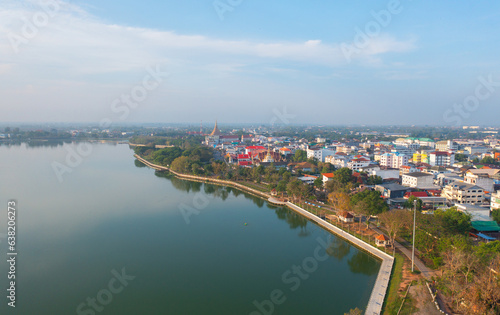 Aerial view of local residential neighborhood roofs. Urban housing development from above. Top view. Real estate in Isan, Khon Kaen urban city town, Thailand. Property real estate. © tampatra