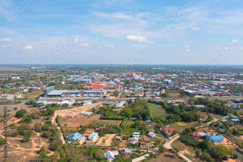 Aerial view of local residential neighborhood roofs. Urban housing development from above. Top view. Real estate in Isan urban city town, Thailand. Property real estate.