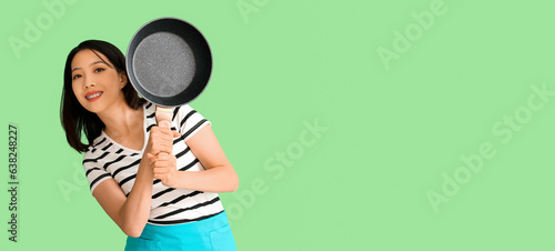 Young Asian woman holding f...