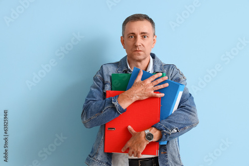 Stressed mature man with fo...