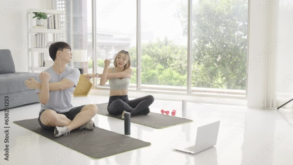 Portrait of a Woman Exercising at Home with Personal Trainer.
Portrait of a Woman Exercising at Home with Personal Trainer.