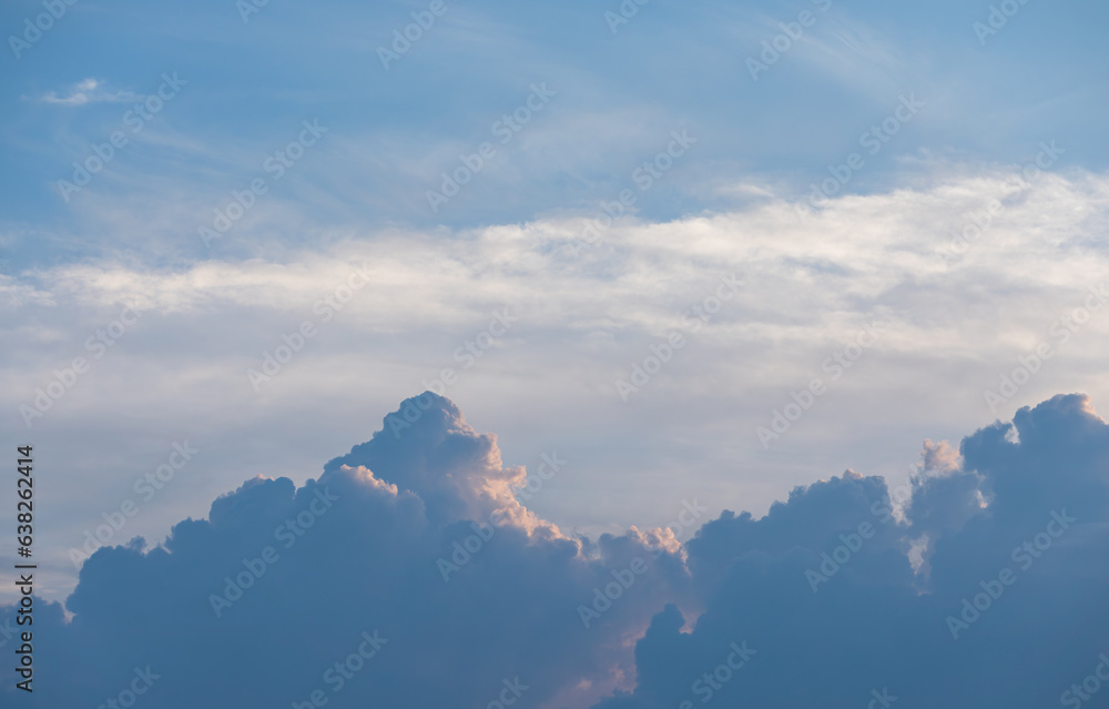 A sky with huge, majestic clouds at sunset. A sky with huge, majestic clouds at sunset.