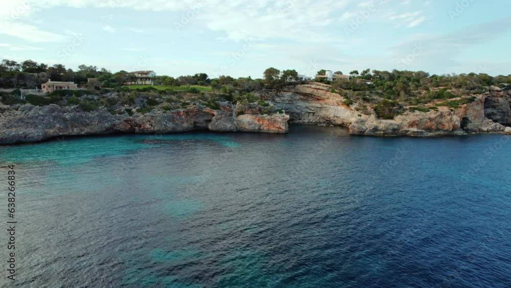 Scenic Landscape Of Cala Llombards In Mallorca, Spain - aerial drone shot Scenic Landscape Of Cala Llombards In Mallorca, Spain - aerial drone shot