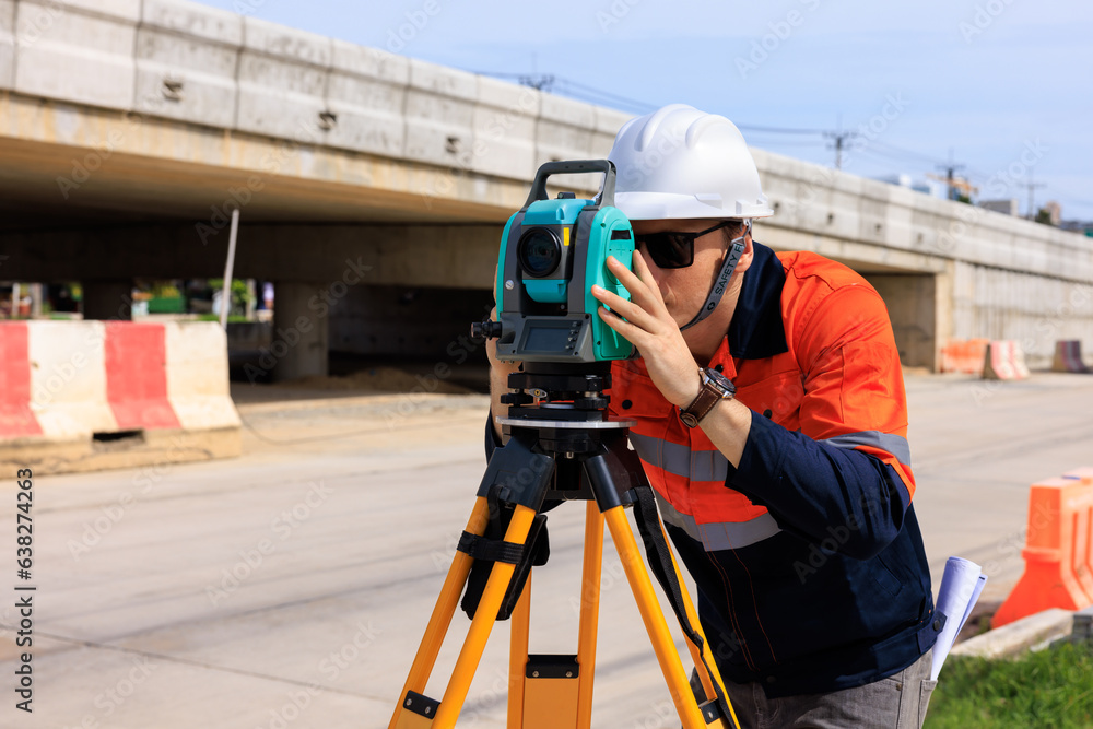 engineer use theodolite equipment for route surveying to build a bridge across the intersection to reduce traffic congestion during rush hours engineer use theodolite equipment for route surveying to build a bridge across the intersection to reduce traffic congestion during rush hours