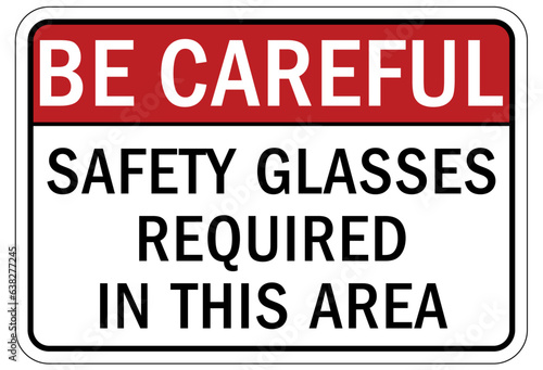 Be careful warning sign and labels safety glasses required in this area