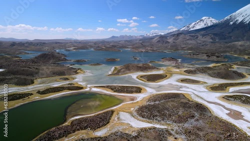 Aerial view of Cotacotani Lagoon, Lauca National Park in Chile - dolly forward, drone shot photo