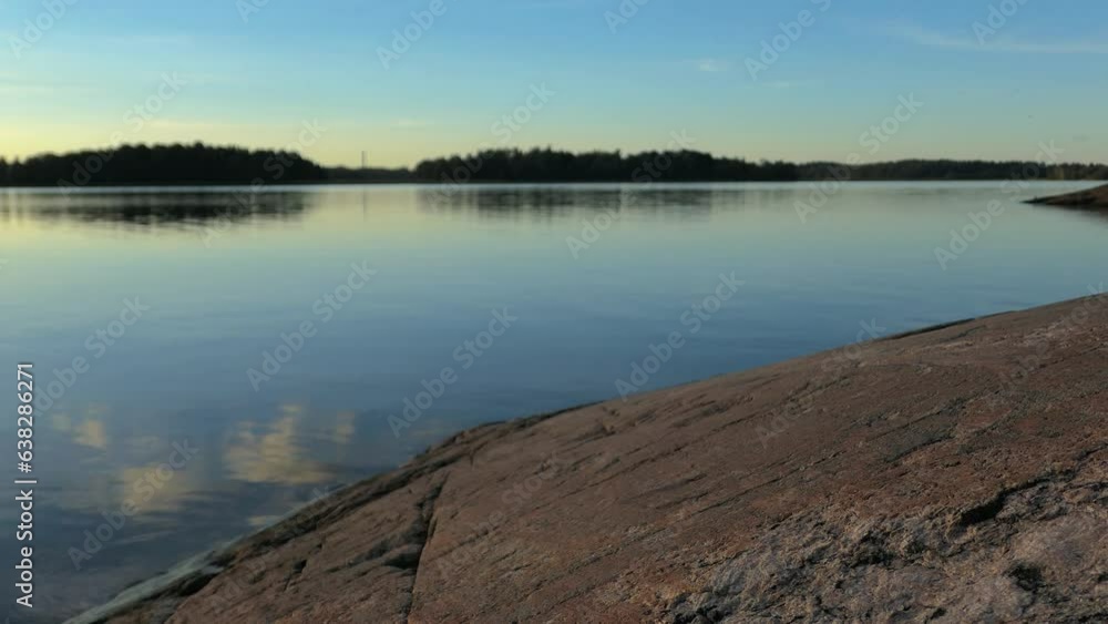 Perfectly calm water summer evening sunset, golden hour at sea Perfectly calm water summer evening sunset, golden hour at sea