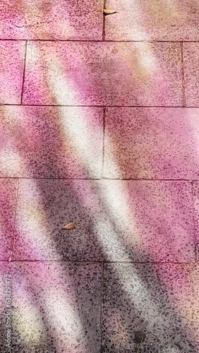 paper reflection of colored lights on the floor stone blocks, different iridescent shades, abstract backgrounds