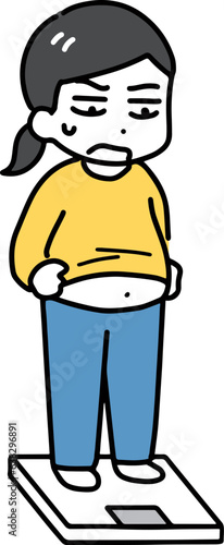 体重を見て困る体重計に乗った私服の若い女性(全身)