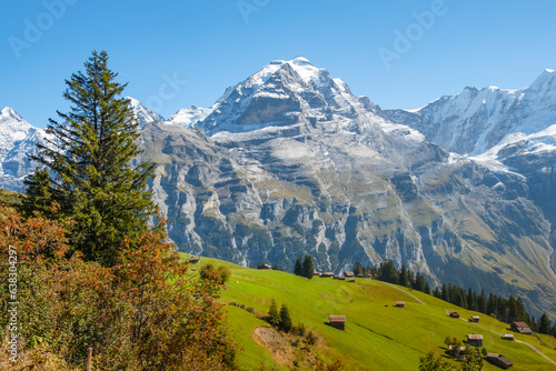 Traditional alpine village in touristic valley Lauterbrunnen, Switzerland attraction
