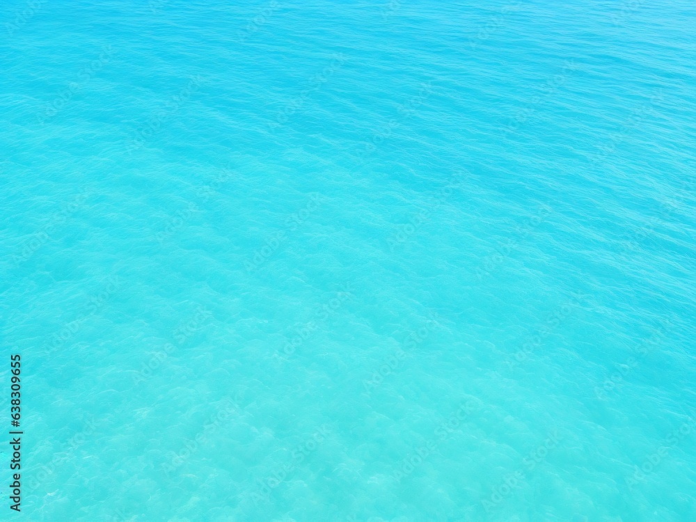 Top view of shiny wave of clear blue sea water, Blue background