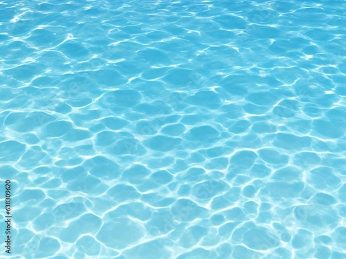 Swimming pool surface with light reflection and water ripple patterns