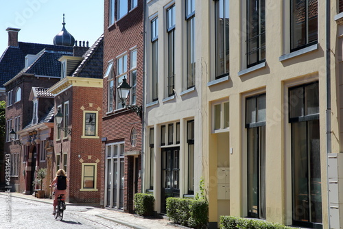 Historic and colorful buildings located on Grote Kerkstraat street in Leeuwarden, Friesland, Netherlands
