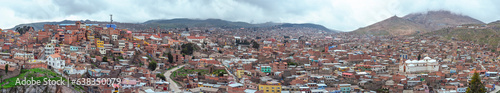 High distant and panoramic view of Potosi city. Neighborhood with houses in a poverty situation and low resources due of the mining industry for centuries. Bolivia. Southamerica