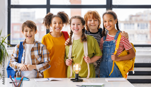 Foto Portrait of  students schoolchildren during lesson.