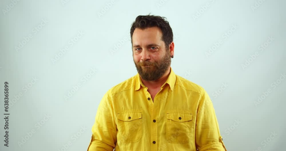 A middle-aged man with a friendly expression on his face is looking at the camera. He is wearing a casual outfit and is smiling broadly. He appears to be happy and content.
A middle-aged man with a friendly expression on his face is looking at the camera. He is wearing a casual outfit and is smiling broadly. He appears to be happy and content.