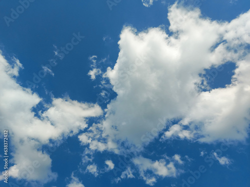 The sky and white clouds at daytime as a background.