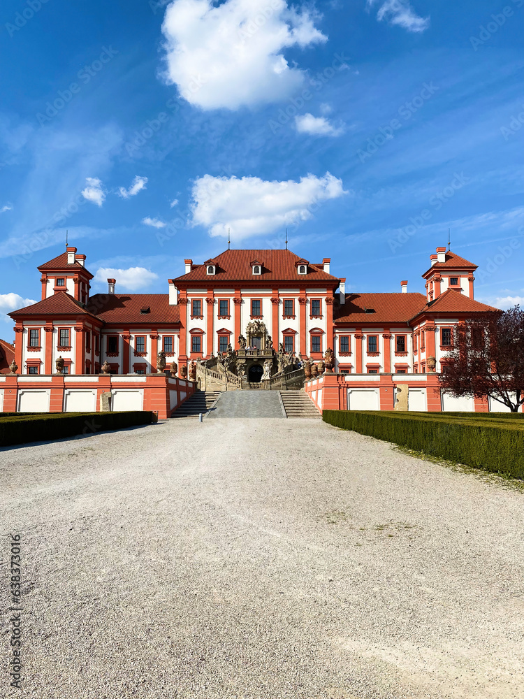 Troja Palace. Historical catle with in the spring morning. Beautiful baroque chateau with road and green garden. Cityscape scene from Troja, Prague, Czech Republic