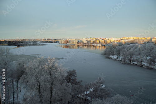 Photography Landscape of river and buildings in central Stockholm on a snowy winter day in S