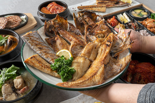 Soybean paste stew, rice, grilled fish, braised kimchi mackerel Korean food dish