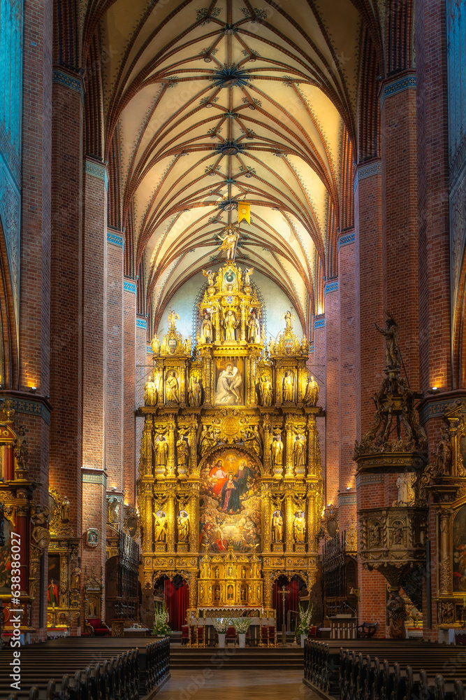 Beautiful golden and ornate altar of Church of the Assumption of the Blessed Virgin Mary, Cathedral Basilica in Pelplin, Poland