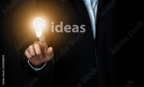 Creative idea business with light bulb concept, Man hand touch light bulb, innovative idea of ​​inspiration from online technology. Business growth, creative thinking and learning.