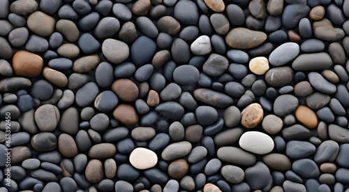 Pebbel stones wall background. harmonic background at pebbel beach with stones. Small sea stones, gravel. Background. Textures. Stone wall texture, Decorative rocks. 