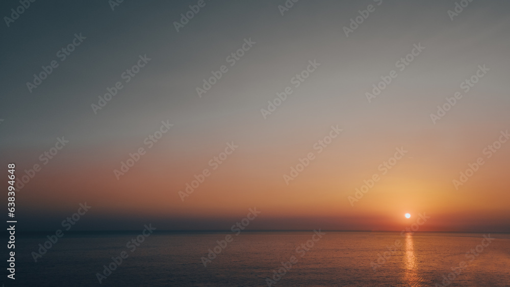 Negative space at sunset. Sea, sun in cinematic style