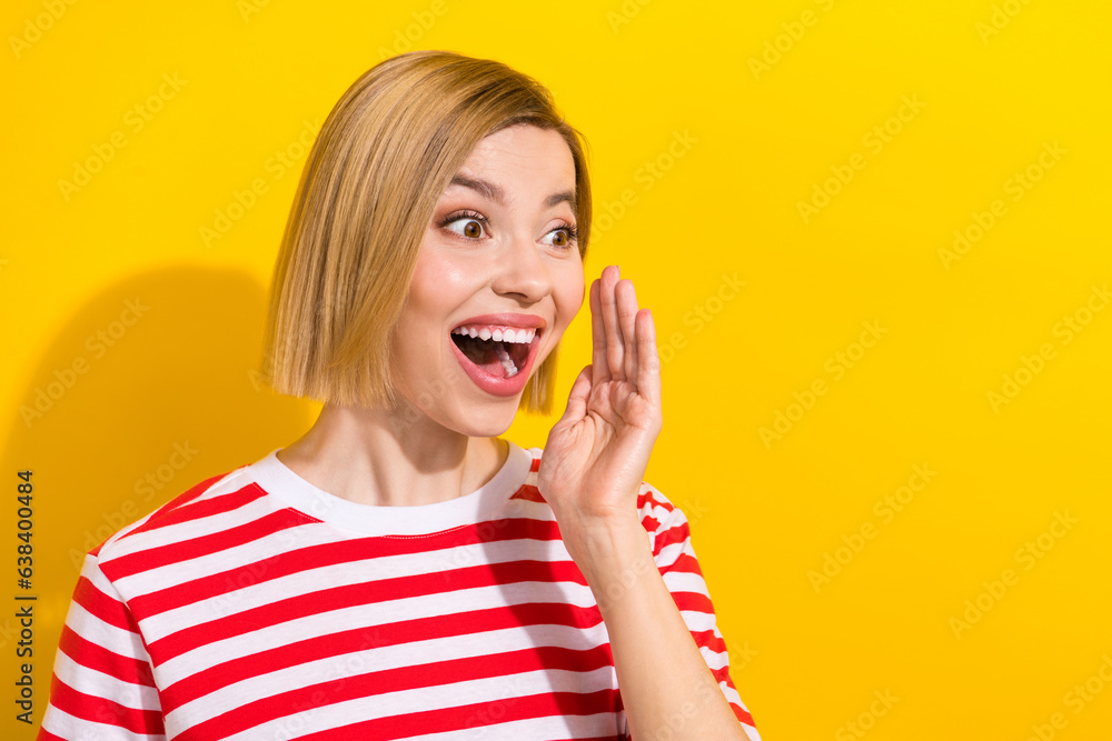 Photo of cheerful surprised girl wear trendy clothes announces summer sale look empty space isolated on yellow color background Photo of cheerful surprised girl wear trendy clothes announces summer sale look empty space isolated on yellow color background