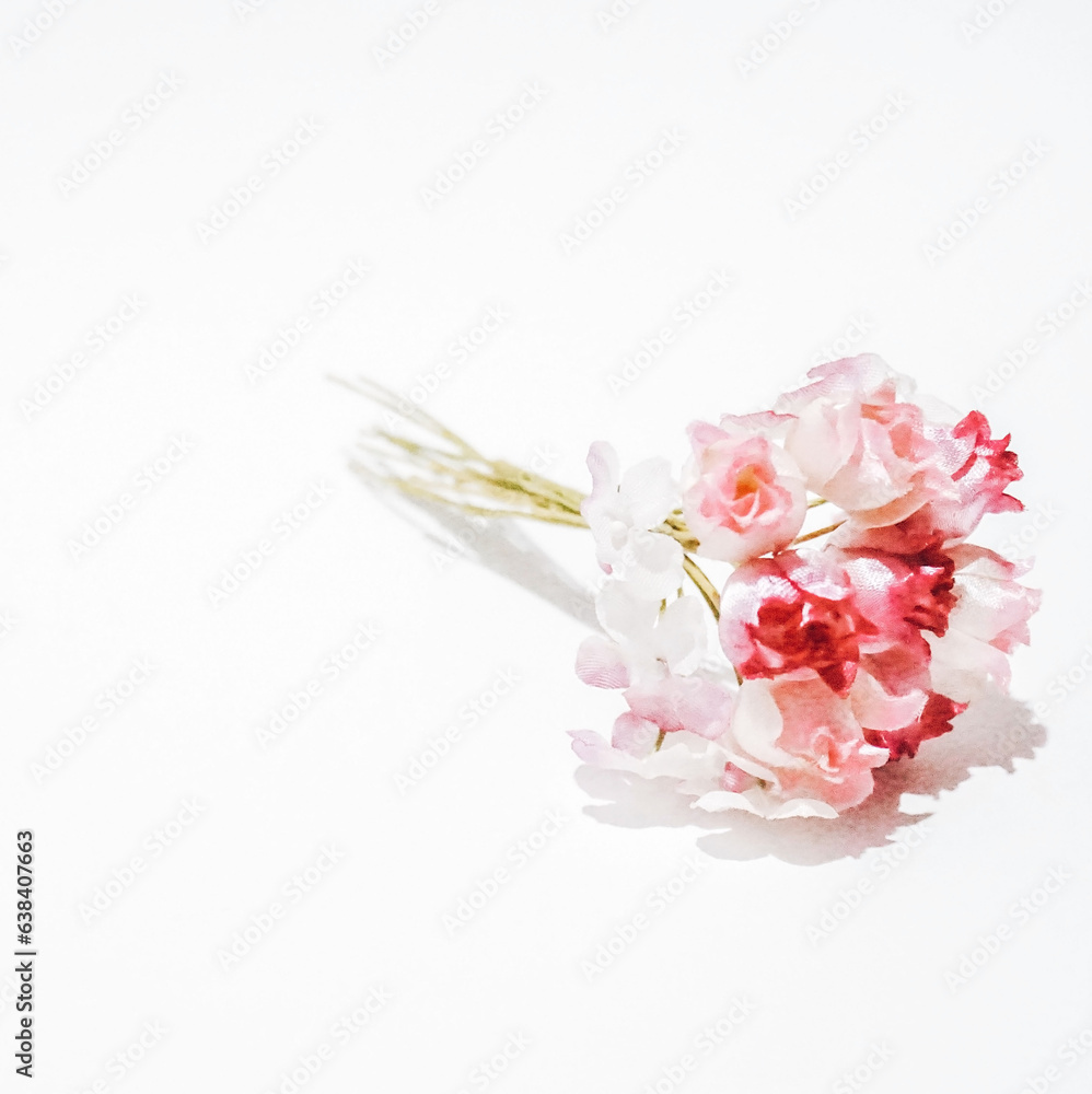bouquet of artificial flowers on a white background, soft focus bouquet of artificial flowers on a white background, soft focus