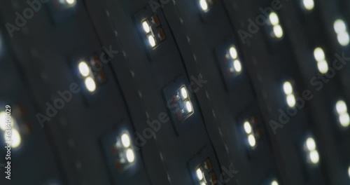 Macro shot of multicolored RGB diode blinking lights. LED colored dots led light panel with different effects.