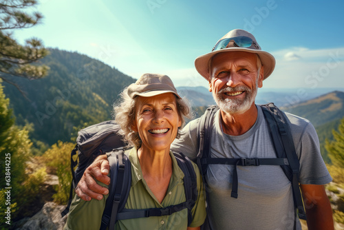 cheerful tourists-pensioners on a hike with backpacks.