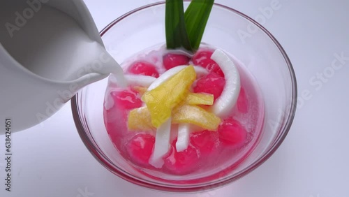 Tub Tim Krob Thai traditional dessert Crispy Ruby in coconut milk. Sweet taste eat with ice for freshness. photo