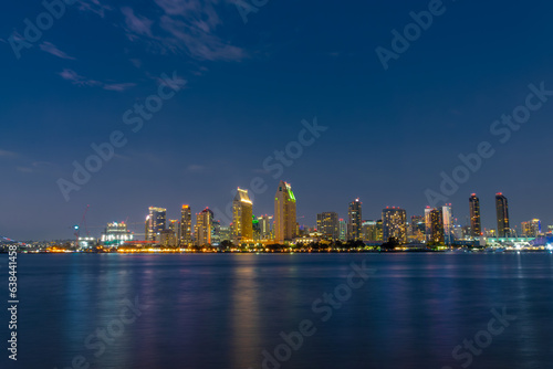 San Diego skyline at night with water colorful reflections, view from Coronado island, California © Delphotostock