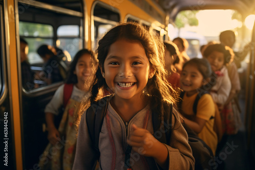 A girl smiles on a bus with a backpack
