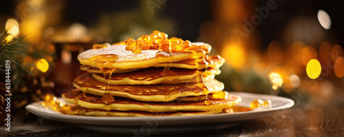 Pancakes in golden light with butter and jam. on white plate. Pancakes wide banner