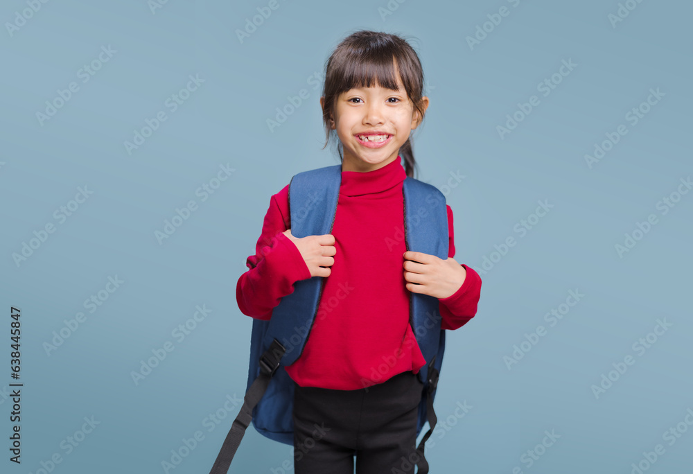 Little girl carrying a school bag and going to school. Little girl carrying a school bag and going to school.