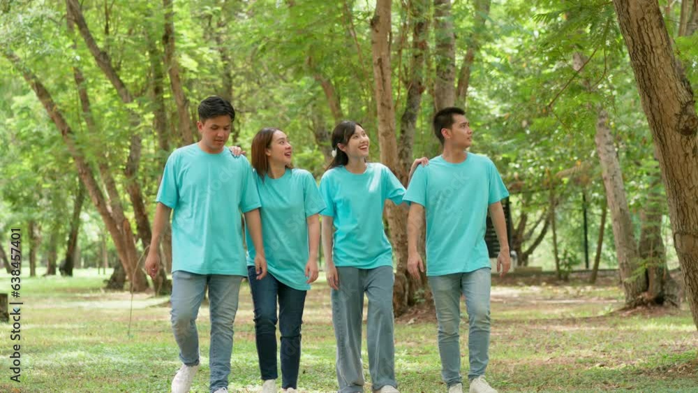 Portrait of happy young Asian students volunteers for cleaning park, forest and woods for healthy environment. Earth day, nature or support with team of people outdoor to recycle or change environment Portrait of happy young Asian students volunteers for cleaning park, forest and woods for healthy environment. Earth day, nature or support with team of people outdoor to recycle or change environment
