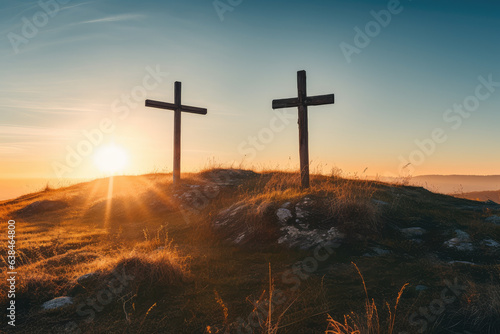 Wooden cross on top of a hill, beautiful sunset